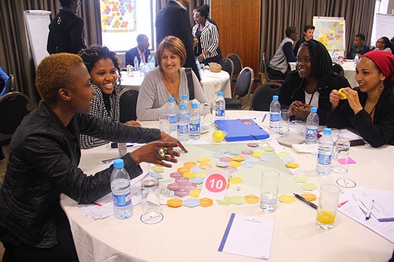 (L to R) Siphelele Malaza (chemistry), Akhona Stafane (economist), Kathy Erasmus (scholarship program coordinator), Livhuwani Magidi (industrial engineer), Quahiera Constant (Photo: Megan Lindow).