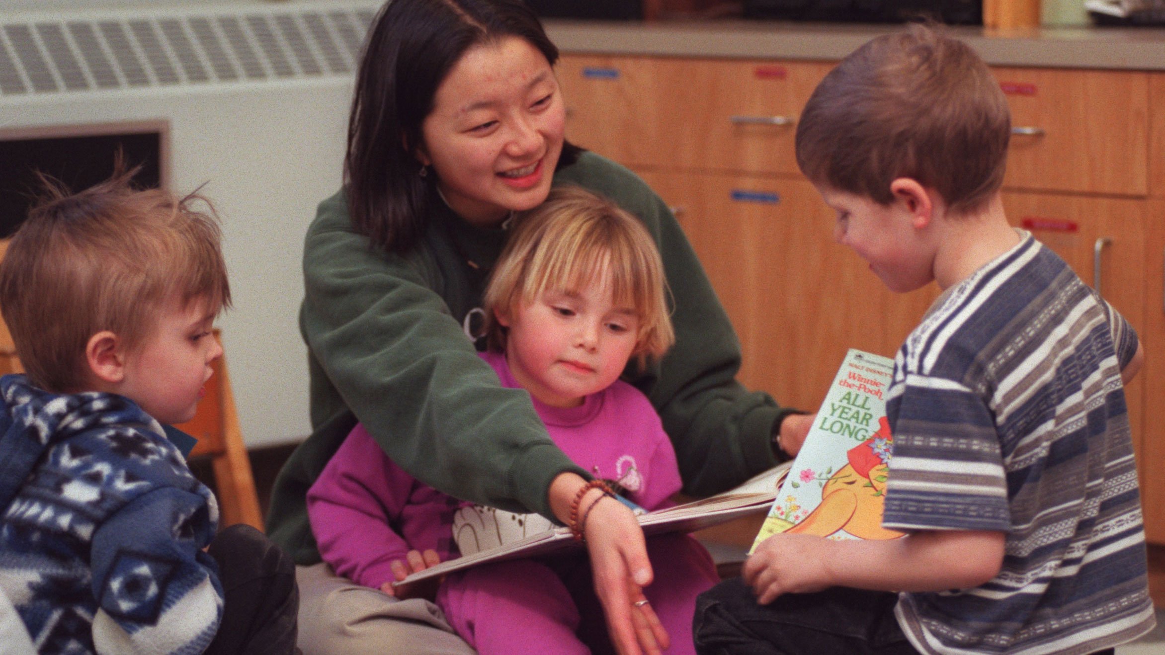 Heidi Schillinger, a senior at St. Olaf College, reads to kids with the Three Rivers Community Action Head Start Program in Northfield, Minnesota. (Photo: Joey McLeister/Star Tribute via Getty Images)