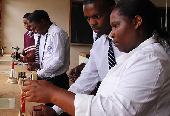 Gloria Natukunda teaches chemistry at two different high schools in Western Uganda. (Photo: Megan Lindow)