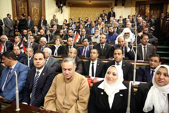 In Cairo, members of the Egypt parliament attend its first session in three years.