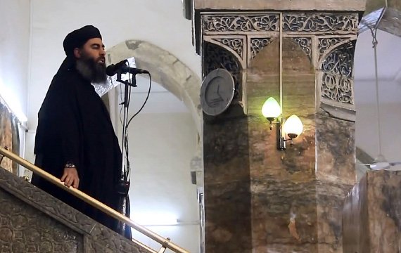 An image taken from a video allegedly shows Abu Bakr al-Baghdadi preaching at a mosque in Mosul, Iraq. Al-Furqan Media/Anadolu Agency/Getty Images