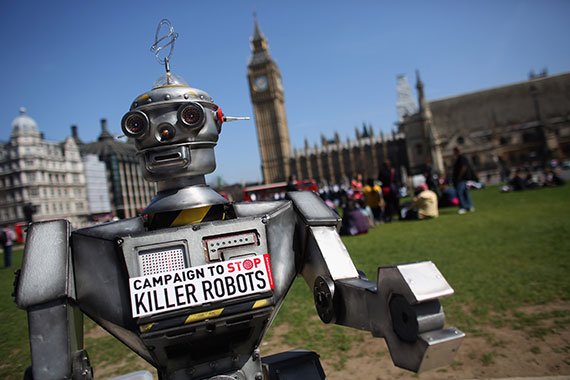 A robot distributes promotional literature in London’s Parliament Square at the April 2013 launch of the Campaign to Stop Killer Robots, an international coalition working to preemptively ban fully autonomous weapons. (Photo: Oli Scarff/Getty Images)