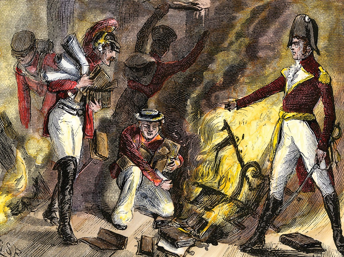 During the War of 1812 British forces burned the U.S. Capitol and the 3,700- volume Library of Congress. This woodcut shows the British commander ordering his men to “Light up!” the fire with books. (Photo: North Wind Picture Archives/Alamy Stock Photo)