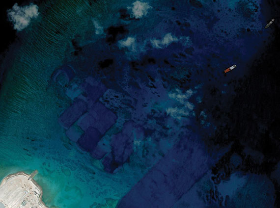 From the Asia Maritime Transparency Initiative’s “Island Tracker,” satellite imagery of land reclamation on Fiery Cross Reef, part of China’s largescale island-building in the South China Sea. (Photo: CSIS/AMTI DigitalGlobe)