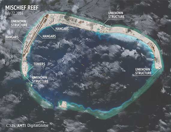 According to AMTI’s website: “Each of the three islets [Fiery Cross, Subi, and Mischief reefs] will soon have hangar space for 24 fighter-jets plus 3–4 larger planes.” (Photo: CSIS/AMTI DigitalGlobe)