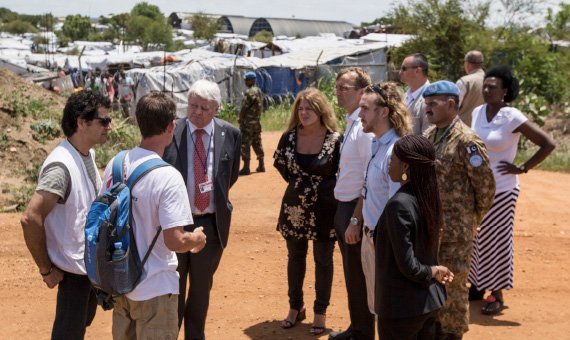 Hervé Ladsous (fourth from the left), Under-Secretary-General for UN Peacekeeping Operations, on a visit to Tomping Camp, in Juba, Republic of South Sudan, where the UN was protecting roughly 20,000 civilians displaced by fighting; UN Photo/Isaac Billly