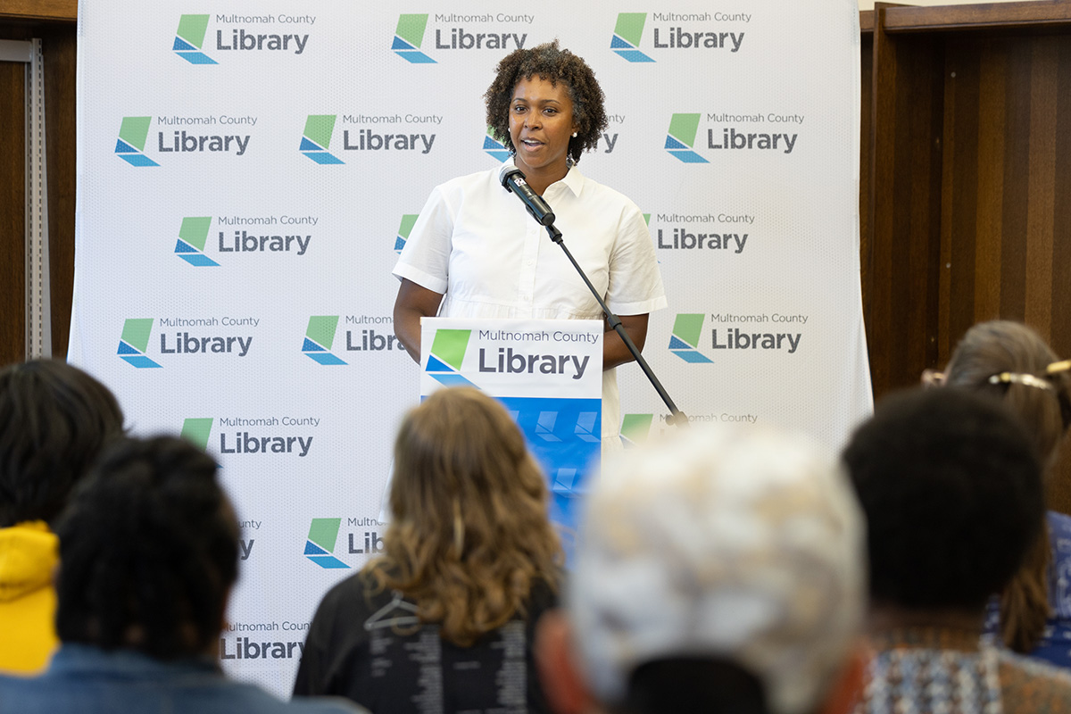 Karis Stoudamire-Phillips speaks at the groundbreaking ceremony for the renovation of North Portland Library in May 2023