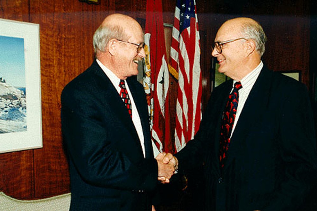 Under Secretary of State for Arms Control and International Security John D. Holum (left) congratulates Dr. Norman P. Neureiter upon his swearing-in on September 19, 2000, as the nation’s first Science and Technology Adviser to Secretary of State Madeleine K. Albright.