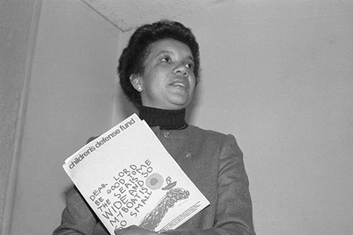 Picture shows children's activist, author, Marian Wright Edelman, holding a book sponsered by the Children's Defence Fund. Undated photo circa 1970s.