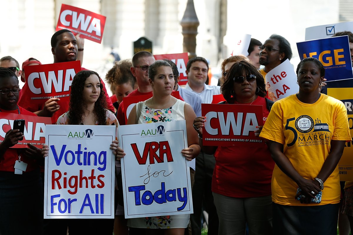 Activists attend a Voting Rights Amendment Act rally on June 25, 2014, in Washington, D.C. The rally marked the one-year anniversary of the Supreme Court decision in Shelby County v. Holder that held a section of the Voting Rights Act of 1965 is unconstitutional. (Win McNamee/Getty Images)