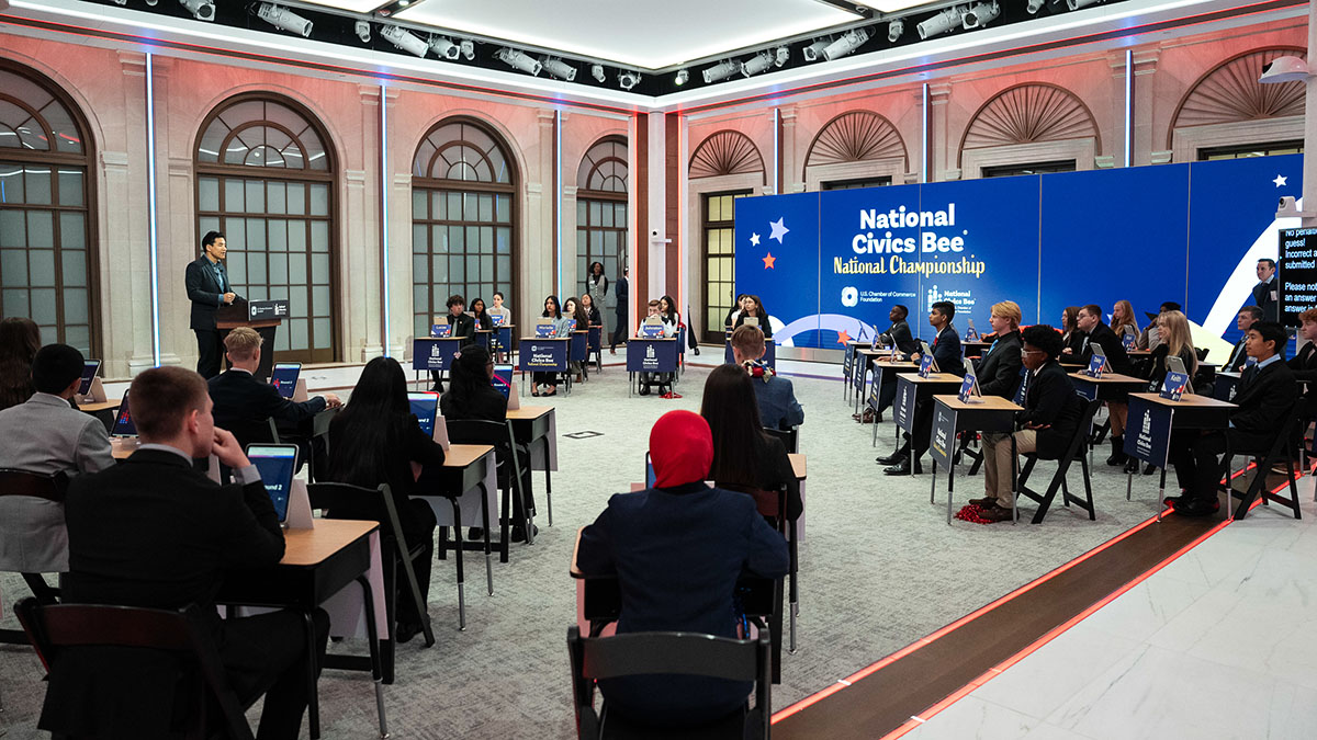 A room of National Civics Bee contestants sit at desks