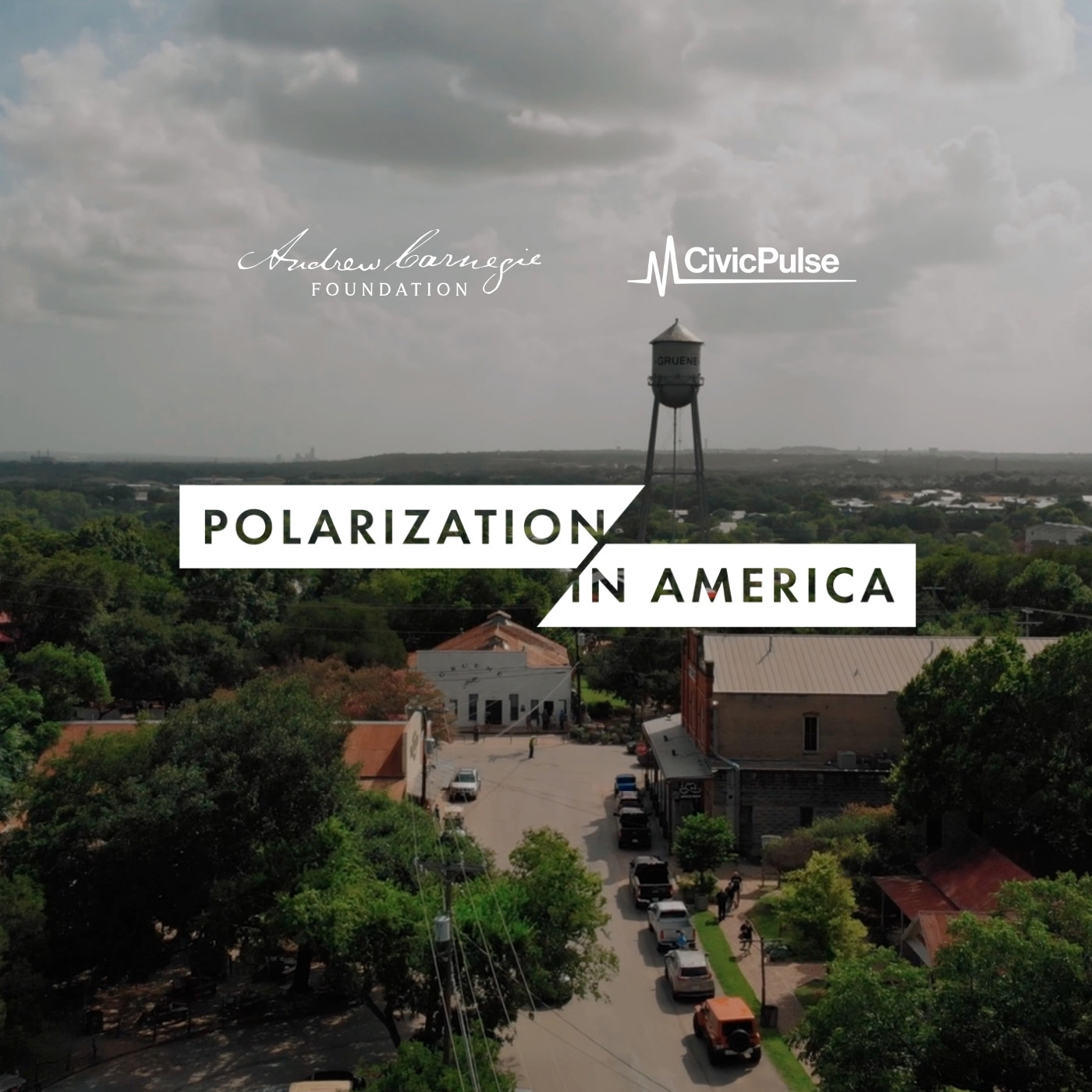 White text reading "Polarization in America" over a rural town with trees